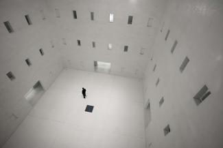 white and gray floor tiles by Jan Genge courtesy of Unsplash.