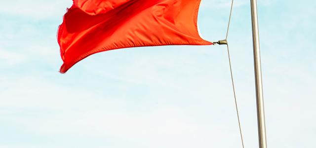 red flag by Carson Masterson courtesy of Unsplash.